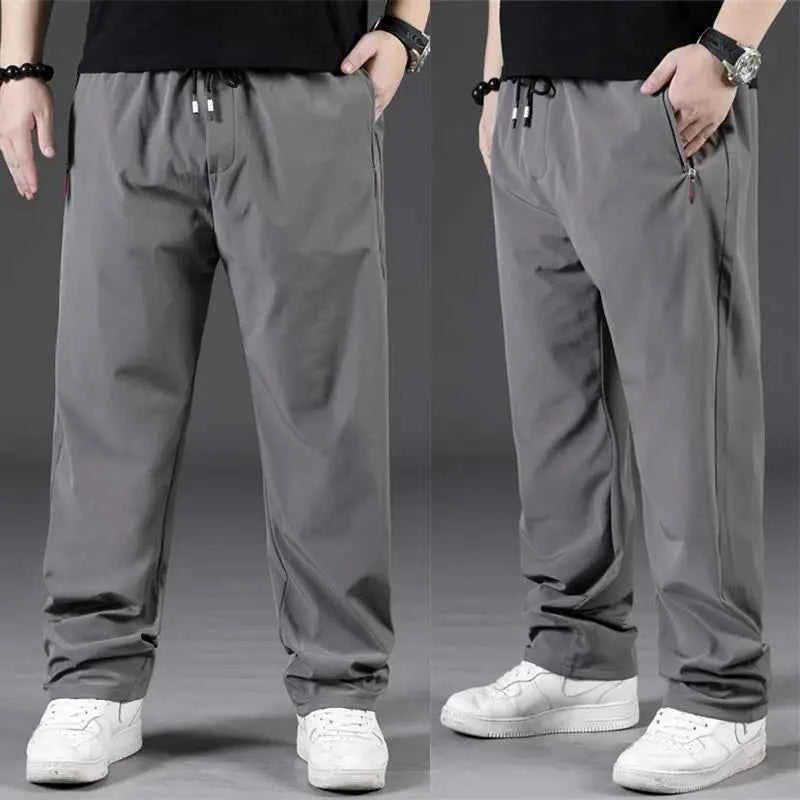 8XL Casual Pants Mens Straight Loose Trousers Men Clothing Elastic Waist Quick Dry Pants Summer Fashion Oversized Joggers Pants